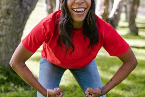 Strong girl smiling in the park.